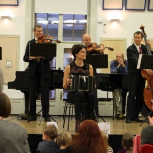 Playing for children at the Budapest festival Orchestra's event with Lanner Quartet. The host of the event is Iván Fischer.